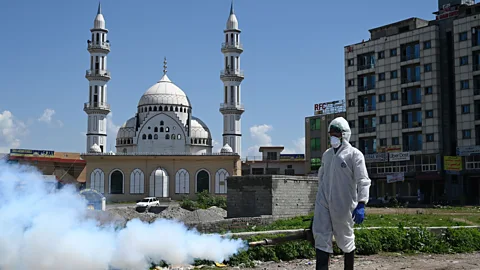 Aamir Qureshi/Getty Images Some Pakistanis liken zakat giving to a spiritual cleansing (Credit: Aamir Qureshi/Getty Images)