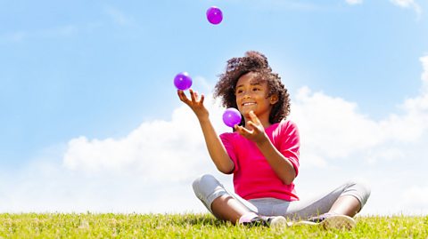 Girl juggling