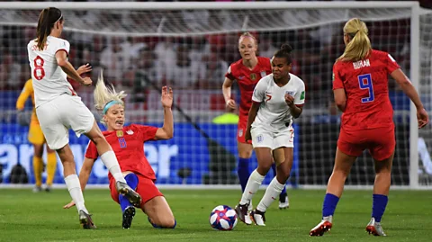 Getty Images Football fans wear the colours of their teams to show affinity with their "tribe" (Credit: Getty Images)