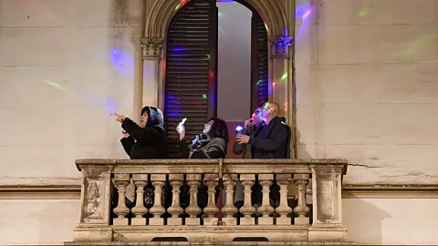 Nicolo Campo/Getty Images Community-organised balcony events are helping to offer people hope during an uncertain period (Credit: Nicolo Campo/Getty Images)