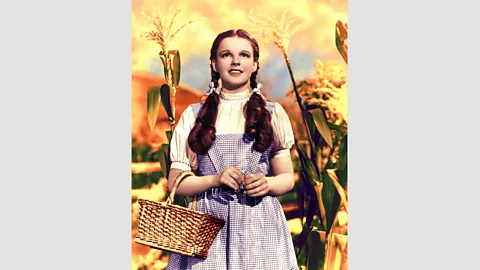 Alamy After Aunt Em tells Dorothy to find ‘a place where you won’t get into any trouble’ in The Wizard of Oz, the girl (played by Judy Garland) sings Over the Rainbow (Credit: Alamy)