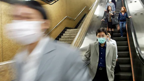 Getty Images The 2003 Sars outbreak was quickly recognised as a serious danger to health (Credit: Getty Images)