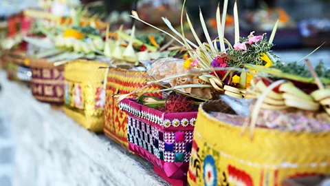 404303/Getty Images On the eve of Nyepi, offerings are made to appease demons (Credit: 404303/Getty Images)