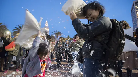 NurPhoto/Getty Images The annual Valentine’s Day Great Pillow Fight shows another unconventional side to the city (Credit: NurPhoto/Getty Images)