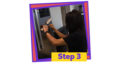 Step 3: Stick the first pipe in the top corner of a fridge, the door, or a wardrobe.