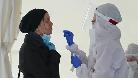 Getty Images The first time a person is infected with Covid-19, it will take their body a while to make antibodies – but these might help to prevent a second infection (Credit: Getty Images).