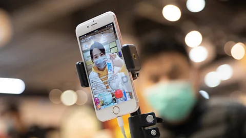 Barcroft Media/Getty Images As soon Covid-19 spiked, people began uploading videos to Douyin and WeChat as a way of coping with the pandemic (Credit: Barcroft Media/Getty Images)
