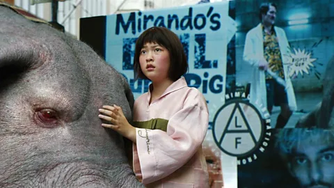 Alamy Bong Joon-ho’s 2017 film Okja tackled the issue of animal exploitation through the tale of a young girl and her ‘super-pig’ companion