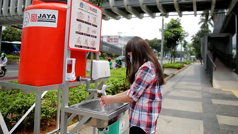 Getty Images Providing handwashing facilities in public places could help to reduce the risk of ing on infections (Credit: Getty Images)
