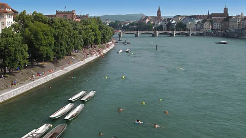 Paul Clemence In summer, many Baselers will jump in the river after work and catch the current home (Credit: Paul Clemence)