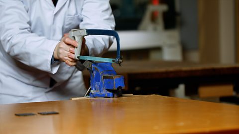 Cutting a shape from metal