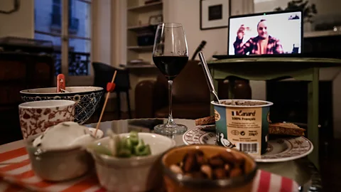 Getty Images A virtual dinner party in France last month. Experts say basic social etiquette transfers to this new era of socialising, too (Credit: Getty Images)