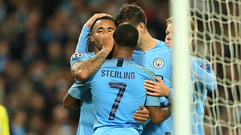 Getty Images Getting close enough to whisper into someone's ear requires a certain degree of intimacy that may now feel strange (Credit: Getty Images)