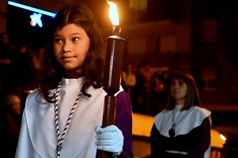 A Spanish Catholic girl in a Good Friday procession