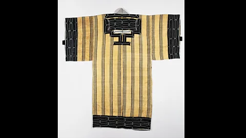 DeAgostini/Getty Images Traditional Ainu clothing was made with animal or fish skin, or woven with tree bark or nettle fibres (Credit: DeAgostini/Getty Images)