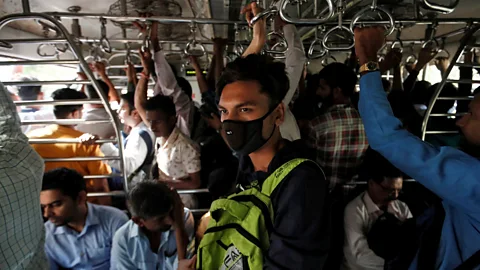 Reuters/Francis Mascarenhas Public transport remains essential in India, and maintaining social distancing is a challenge (Credit: Reuters/Francis Mascarenhas)
