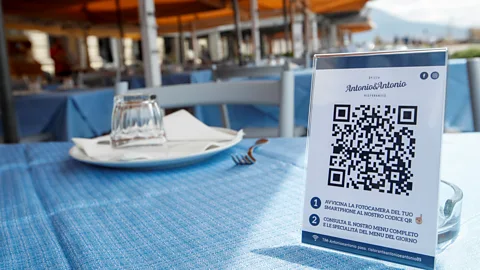 Reuters Some restaurants are turning to QR codes for touch-free ordering, as at this restaurant in Naples, Italy (Credit: Reuters)