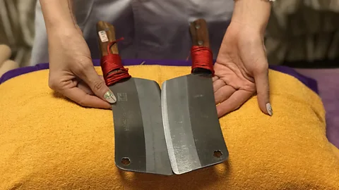 Louise Watt The massage is performed with two blunt, steel cleavers that pummel the entire body (Credit: Louise Watt)