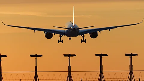 A plane landing at Vancouver airport on 21 March 2020