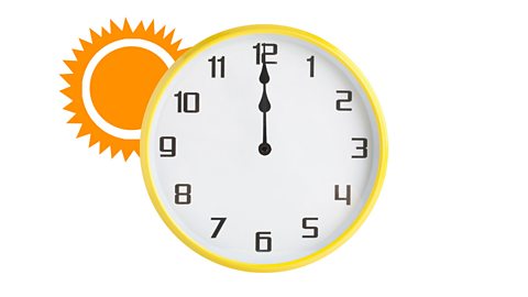 A clock displaying 12 o'clock and a sun