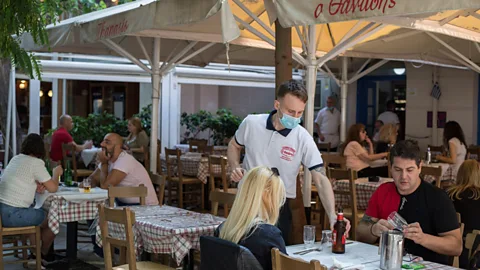 Alamy Hotels and restaurants can operate - as long as they abide by a long list of safety rules