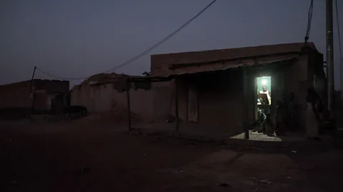 Alamy Connecting remote settlements in Africa to the electricity grid can transform the lives of people living there (Credit: Alamy)