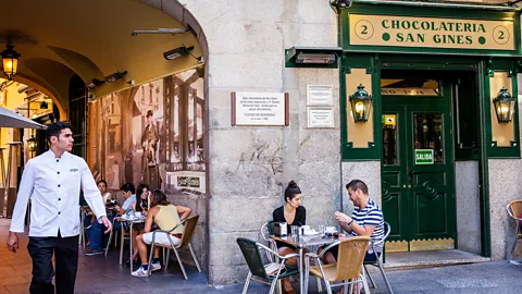 Lucas Vallecillos/Alamy In Spain, churros are often served at chocolaterías (chocolate shops) like Madrid's San Ginés (Credit: Lucas Vallecillos/Alamy)