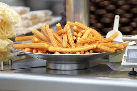 Howard Sayer/Alamy Churros are popular as a walk-around treat at fairs and amusement parks (Credit: Howard Sayer/Alamy)