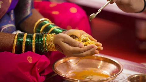 ePhotocorp/Getty Images In Hindu communities, turmeric is used in festive occasions like weddings as a marker of fertility and prosperity (Credit: ePhotocorp/Getty Images)