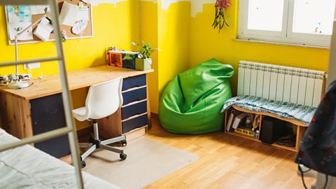 A tidy office space inside of a bedroom