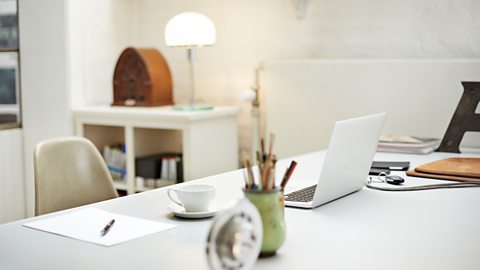 A clean white home workspace 