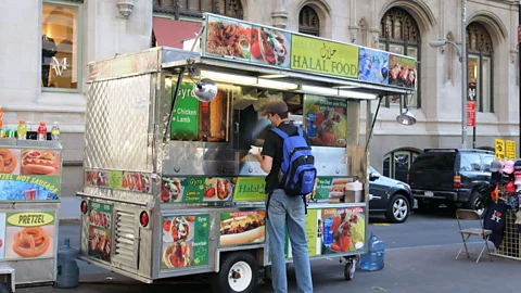 Alamy Even seemingly unimportant encounters, like buying lunch from the same familiar face each day, can buoy you (Credit: Alamy)