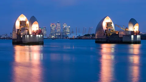 Alamy The Thames Barrier helps to protect London from flooding as caused by the ever increasing tidal range in the Thames Estuary (Credit: Alamy)