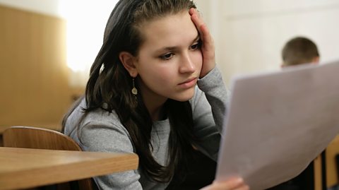 Girl looking anxiously at her results