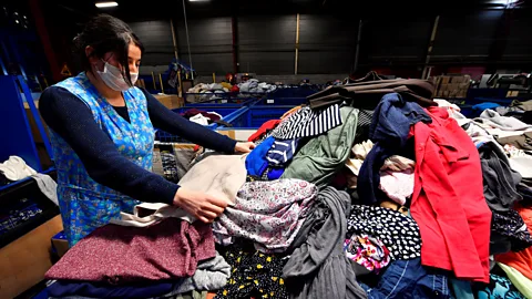 Commentary: Why can't the fashion industry recycle discarded clothes? - CNA