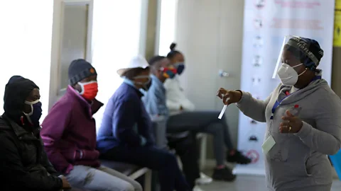 EPA Some of the first South African vaccine trial volunteers, where the Oxford effort is also testing for efficacy (Credit: EPA)
