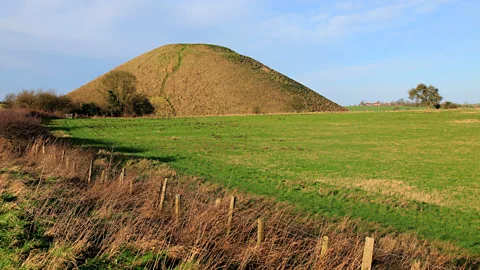 Getty Images Silbury Hill is thought to have been built around 4,000 years ago - but the reasons for its building have been lost (Credit: Getty Images)