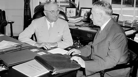 Getty Images President Harry Truman (left) is briefed on the bombing by secretary of war Henry Stimson (Credit: Getty Images)