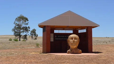 ZUMA Press Inc/Alamy An enormous sculpture of Prince Leonard’s head is one of the main attractions on a tour of the capital (Credit: ZUMA Press Inc/Alamy)