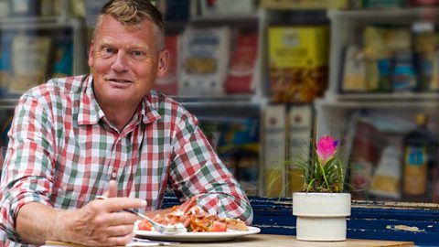 Tom Heap with a plate of food