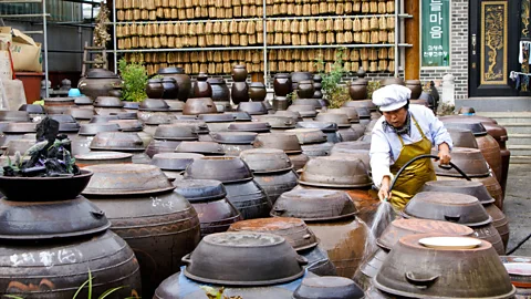 Michele Burgess/Alamy Gochujang is fermented in massive clay pots called onggi (Credit: Michele Burgess/Alamy)