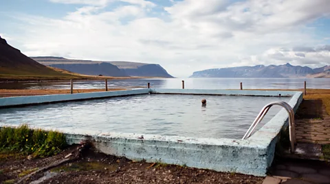 Alex Walker/Getty Images Swimming is a huge part of Icelandic culture, and swimming lessons have been mandatory for children since 1940 (Credit: Alex Walker/Getty Images)