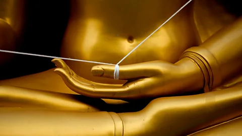 Eric Lafforgue/Alamy The baci ritual incorporates practices from Theravada Buddhism, Brahmanism and animism (Credit: Eric Lafforgue/Alamy)