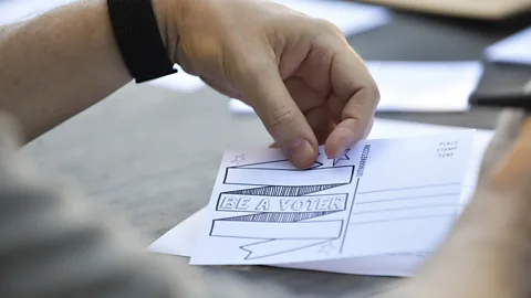 Getty Images Sweeny funnelled her anxieties about politics in the 2016 election into writing postcards to encourage people to vote (Credit: Getty Images)