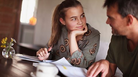 Girl talking to dad