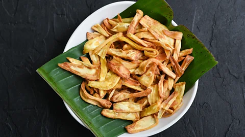 santhosh_varghese/Getty Images Jackfruit is often fried and made into crunchy chips as a snack (Credit: santhosh_varghese/Getty Images)