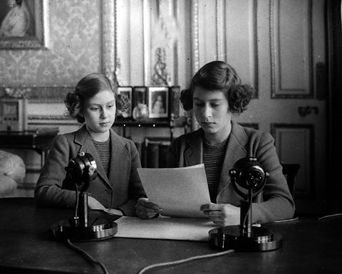 Princess Margaret, on the left, and Princess Elizabeth give their first Children's Hour radio broadcast during World War II on 13th October 1940. 