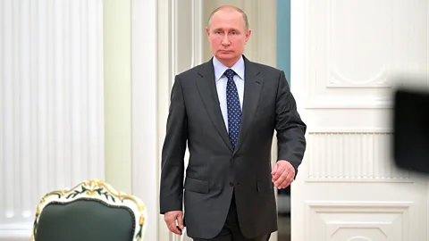 Alamy The way we walk can be distinctive and can often betray information about ourselves, such as with Vladimir Putin's "gunslinger" gait (Credit: Alamy)