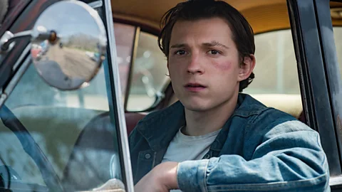 Netflix One of The Devil All the Time’s chief focuses is Arvin (Tom Holland), a young man from an unhappy lineage and with a propensity for vengeance (Credit: Netflix)