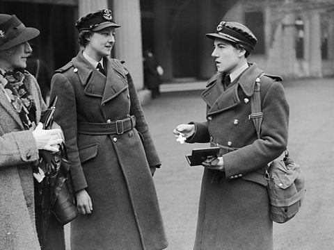 Section Officer Daphne Pearson (1911 - 2000, right) of the Women's Auxiliary Air Force (WAAF) with her George Cross